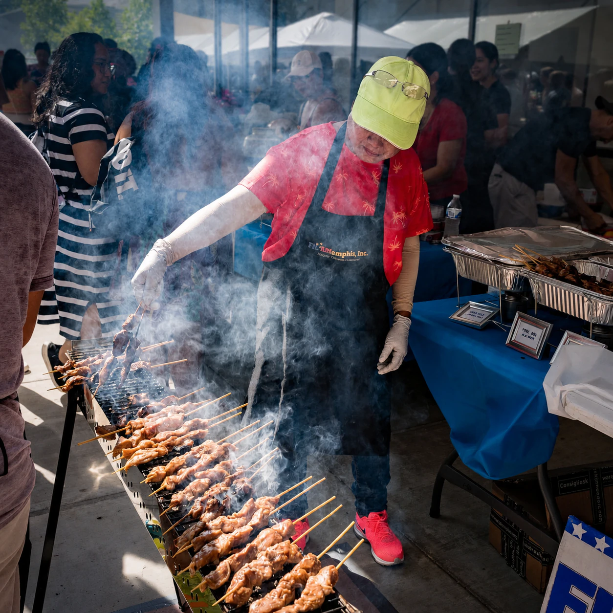 Vendor grilling skewers over charcoal smoke
